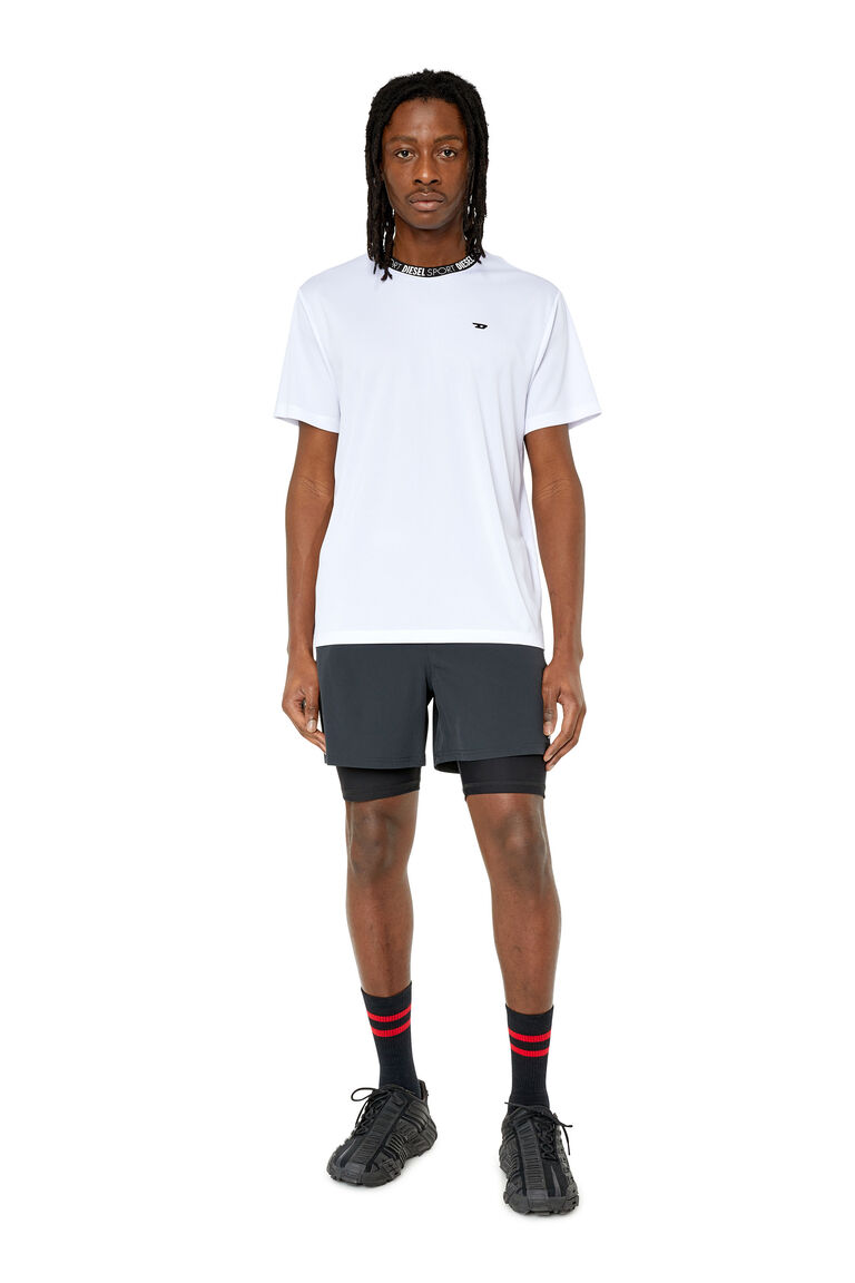 AMWB-ADDIE-WT37 Man: 2-in-1 shorts with logo waist | Diesel A094120BKAT